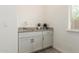 Convenient kitchenette equipped with granite countertops and modern appliances at 20256 E Canary Ct, Queen Creek, AZ 85142