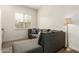 Comfortable living room showcasing a plush sectional sofa and natural light at 20256 E Canary Ct, Queen Creek, AZ 85142