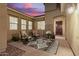 Cozy outdoor patio with comfortable seating, ideal for relaxation and enjoying tranquil evenings at 20256 E Canary Ct, Queen Creek, AZ 85142