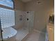 Contemporary bathroom with stand alone tub and glass shower at 20677 N 16Th Way, Phoenix, AZ 85024