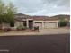 Attractive single-Gathering home with a three-car garage and desert landscaping at 20677 N 16Th Way, Phoenix, AZ 85024