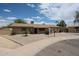 Charming single-story brick home with a well-maintained yard, desert landscaping, and a welcoming entrance at 2222 E Gretta Pl, Phoenix, AZ 85022