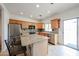 Bright eat-in kitchen boasts granite countertops, modern stainless steel appliances, and ample cabinet space at 2222 E Gretta Pl, Phoenix, AZ 85022