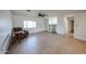 Spacious living room with neutral tile flooring and abundant natural light at 2222 E Gretta Pl, Phoenix, AZ 85022