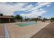 Tennis courts with blue and green features and sunny skies at 2222 E Gretta Pl, Phoenix, AZ 85022