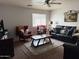 Cozy living room with comfortable seating, decorative accents, and soft lighting at 22966 W Hopi St, Buckeye, AZ 85326