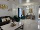 Elegant living room showcasing stylish decor, comfortable seating, and a modern chandelier at 22966 W Hopi St, Buckeye, AZ 85326