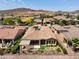 Aerial view showing landscaping, water feature, patio, and desert landscaping surrounded by neighboring homes at 28375 N 130Th Dr, Peoria, AZ 85383