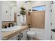 Cozy bathroom featuring a bathtub, toilet, vanity, and convenient shower essentials at 28375 N 130Th Dr, Peoria, AZ 85383