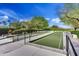 Outdoor bocce ball court with seating, lush landscaping and mountain views for an active lifestyle at 28375 N 130Th Dr, Peoria, AZ 85383