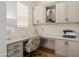 Well designed home office area including large desk and storage with natural light at 28375 N 130Th Dr, Peoria, AZ 85383