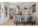 Modern kitchen with stainless steel appliances, granite countertops, and large island offers both style and functionality at 28375 N 130Th Dr, Peoria, AZ 85383