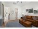 A beautifully staged living room showcases a comfortable seating area and charming decor at 28375 N 130Th Dr, Peoria, AZ 85383