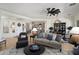 Open floor plan with living room, dining area, and kitchen provides ample space for entertaining and comfortable living at 28375 N 130Th Dr, Peoria, AZ 85383