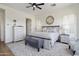 Serene main bedroom with a comfortable bed, soft lighting, and a calming ambiance at 28375 N 130Th Dr, Peoria, AZ 85383