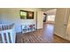 Cozy bedroom featuring wood floors, a storage cube and a television for relaxation at 3002 W Caravaggio Ln, Phoenix, AZ 85086