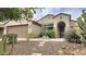 Charming single-story home with desert landscaping and a covered front entrance at 3002 W Caravaggio Ln, Phoenix, AZ 85086