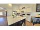 Bright kitchen featuring an island sink, stainless appliances, and white cabinets at 3002 W Caravaggio Ln, Phoenix, AZ 85086