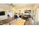 Open concept living room with kitchen and dining area, ideal for entertaining at 3002 W Caravaggio Ln, Phoenix, AZ 85086