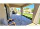 Covered patio area featuring gray stone pavers, a view of the landscaped backyard at 3002 W Caravaggio Ln, Phoenix, AZ 85086