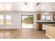 Eat in kitchen with a sliding glass door to the backyard and lots of natural light at 304 E Beth Dr, Phoenix, AZ 85042