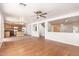 Bright, open-concept living space with hardwood floors and seamless flow into the kitchen area at 304 E Beth Dr, Phoenix, AZ 85042
