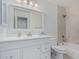 Bright bathroom featuring a tub-shower combo and single sink vanity at 3059 E Tyson Ct, Gilbert, AZ 85295