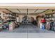 Spacious two car garage with ample storage, shelving, and room for organization at 3059 E Tyson Ct, Gilbert, AZ 85295
