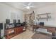 Office space with built-in bookcase and dark wood executive desk at 3059 E Tyson Ct, Gilbert, AZ 85295