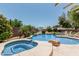 Enjoy this gorgeous backyard pool and spa with desert landscaping, perfect for outdoor relaxation at 3059 E Tyson Ct, Gilbert, AZ 85295