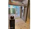 Bathroom walk-in shower with multi-showerhead system and sliding glass door to outdoor space at 3137 N 4Th Ave, Phoenix, AZ 85013