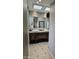 Bathroom with custom vanity, dual sinks, and stylish mirror and lighting at 3137 N 4Th Ave, Phoenix, AZ 85013