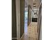 Hallway view to bathroom with walk-in shower and elegant vanity at 3137 N 4Th Ave, Phoenix, AZ 85013
