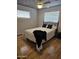 Cozy bedroom with hardwood floors, ceiling fan, and lots of natural light at 3137 N 4Th Ave, Phoenix, AZ 85013