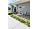 Cozy front porch adorned with decorative plants, comfortable seating, creating a welcoming outdoor space to unwind at 3137 N 4Th Ave, Phoenix, AZ 85013