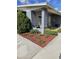 Charming single-story home offers a cozy front porch with decorative plants, and a water feature at 3137 N 4Th Ave, Phoenix, AZ 85013