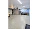Large garage featuring epoxy floors, storage cabinets, and work area at 3137 N 4Th Ave, Phoenix, AZ 85013