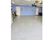 Spacious garage with epoxy floors, providing ample room for parking and storage at 3137 N 4Th Ave, Phoenix, AZ 85013