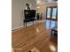 Spacious living room featuring gleaming hardwood floors and French doors, connecting indoor comfort with outdoor allure at 3137 N 4Th Ave, Phoenix, AZ 85013