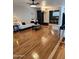 Bright living room features hardwood floors, a fireplace, and modern furnishings at 3137 N 4Th Ave, Phoenix, AZ 85013