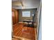 Cozy office space with hardwood floors, a ceiling fan, and a large window at 3137 N 4Th Ave, Phoenix, AZ 85013