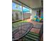 Cozy patio with outdoor seating and shade umbrella at 3137 N 4Th Ave, Phoenix, AZ 85013
