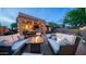 Beautiful backyard patio with a fire pit and lounge area, ideal for entertaining guests at 3521 N Barron --, Mesa, AZ 85207