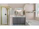 Stylish bathroom featuring double sinks, a separate shower, and a soaking tub for ultimate relaxation at 3521 N Barron --, Mesa, AZ 85207