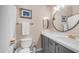 Bathroom featuring stylish vanity, modern fixtures, toilet, and framed artwork providing a modern aesthetic at 3521 N Barron --, Mesa, AZ 85207