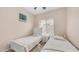 Bright bedroom featuring two twin beds, a nightstand, and ample natural light for a cozy living space at 3521 N Barron --, Mesa, AZ 85207