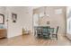 Bright dining room with a decorative chandelier and large window at 3521 N Barron --, Mesa, AZ 85207