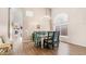 Dining room with an eye-catching light fixture and large window at 3521 N Barron --, Mesa, AZ 85207