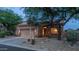Desert landscaping enhances this home's curb appeal, complemented by a two-car garage and neutral exterior at 3521 N Barron --, Mesa, AZ 85207