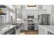 Well-appointed kitchen featuring stainless appliances, stylish countertops, and ample cabinet space for storage at 3521 N Barron --, Mesa, AZ 85207